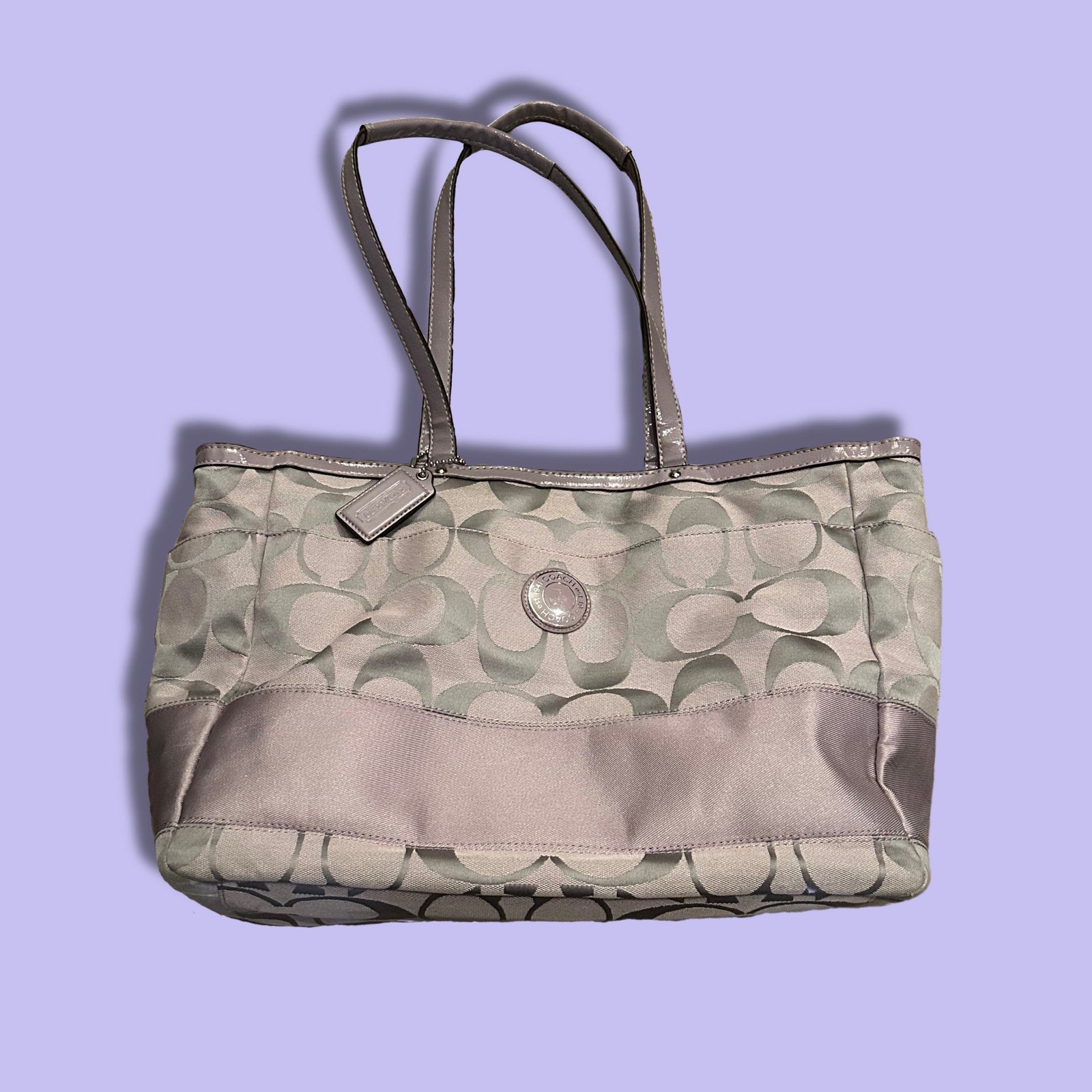 Purple coach orders diaper bag